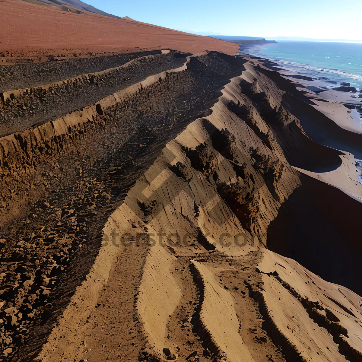 Picture of Desert Landscape: Majestic Dunes and Rocky Mountains