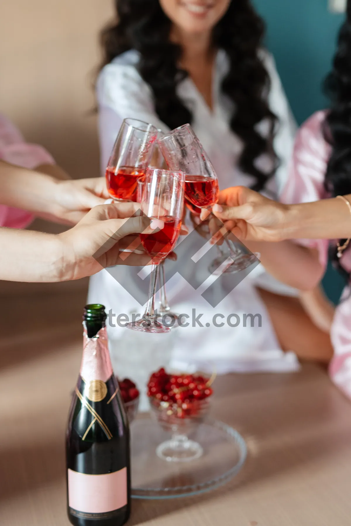 Picture of Wine glasses toasting in celebration