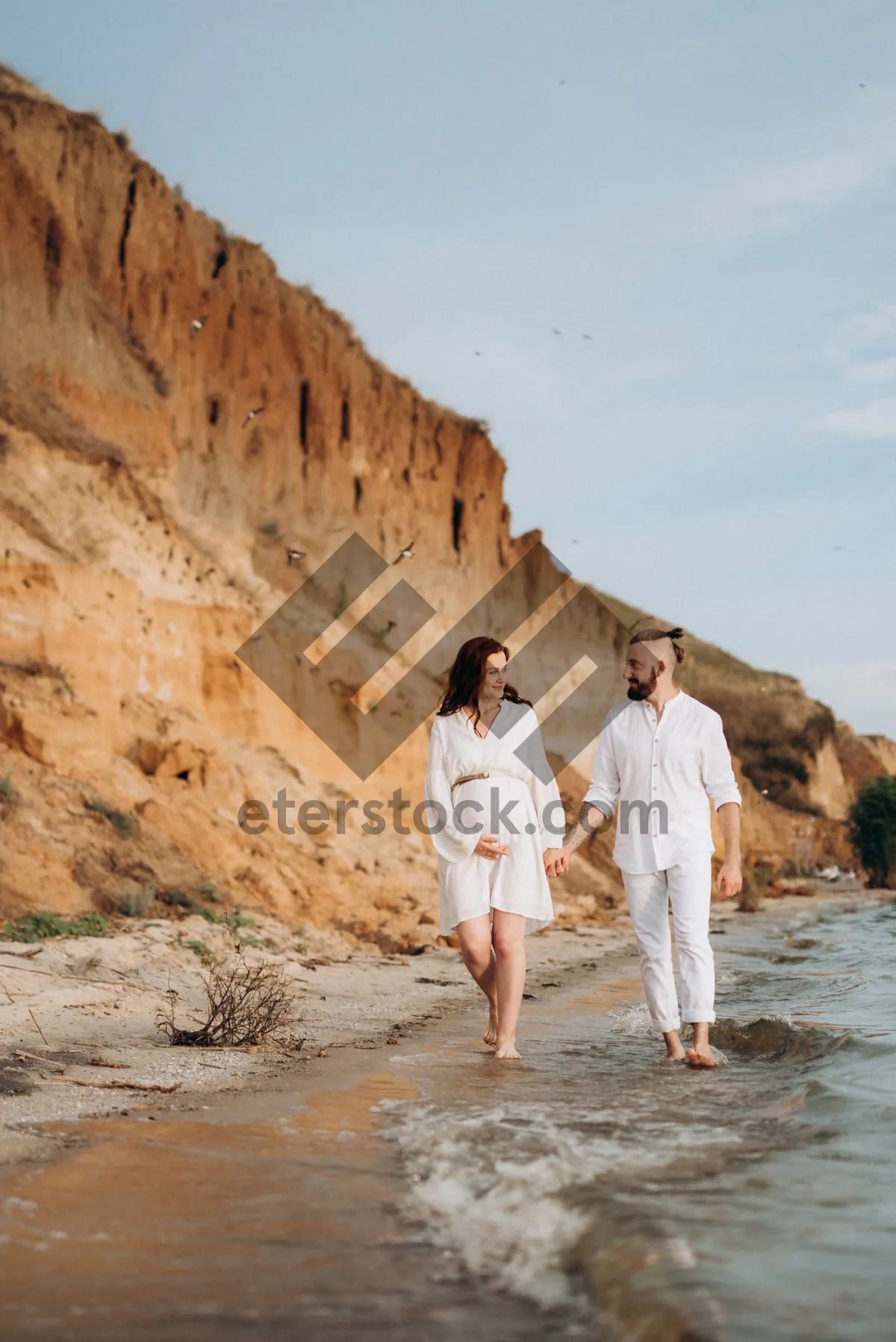 Picture of Traveler enjoying beach holiday under clear blue sky