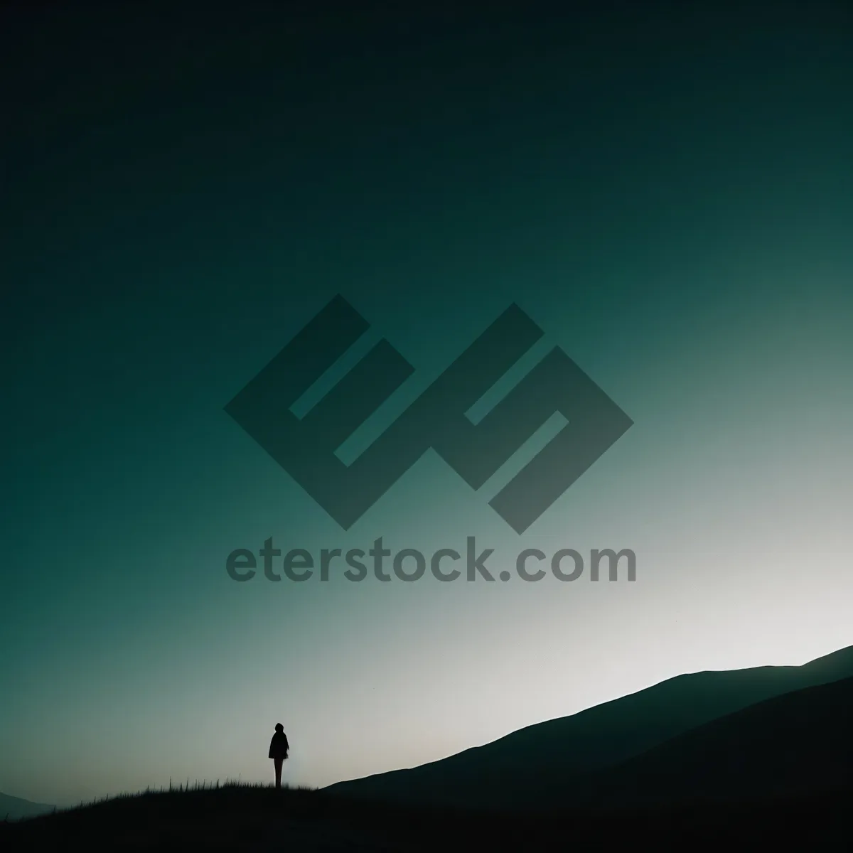 Picture of Sunset Mountain Landscape Silhouette Over Desert Horizon