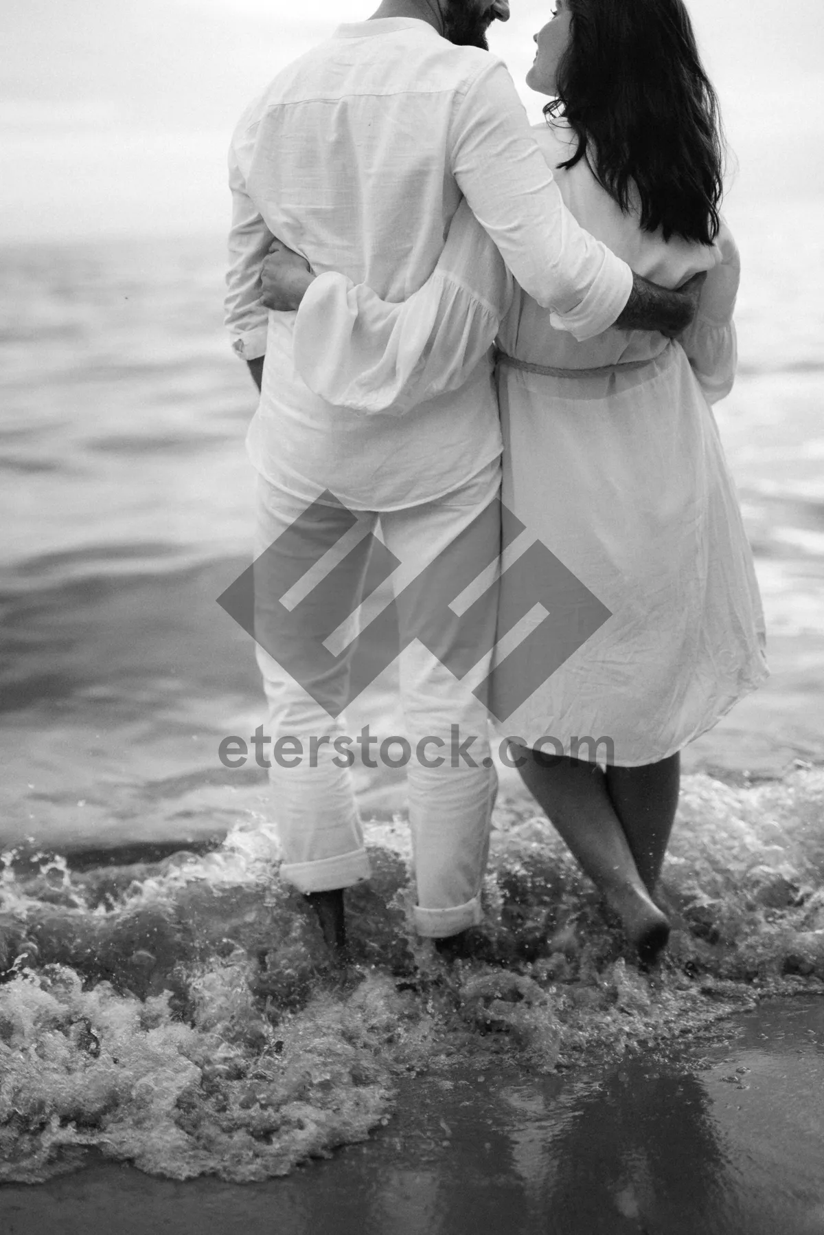 Picture of Happy family stroll on beach during summer vacation.