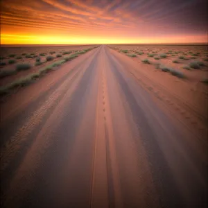 Fiery Desert Sunset: Vibrant Celestial Horizon