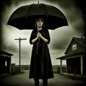 Stylish Rain Protection: Adult Holding Umbrella
