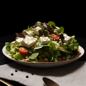 Gourmet vegetable salad with grilled meat and cheese
