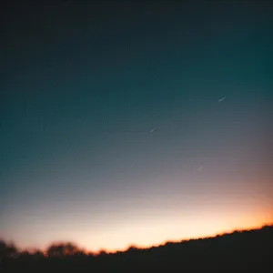 Colorful Sunset Sky with Bright Sun and Puffy Clouds