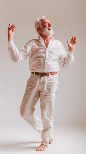 Happy smiling professional man standing in studio portrait.