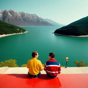 Serene Coastal Escape with Majestic Mountains and Azure Waters