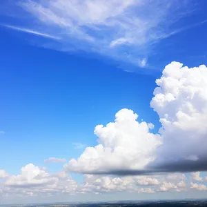 Vibrant Summer Sky with Fluffy Clouds