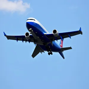 High-Flying Airliner with Majestic Wings Soaring Through the Sky