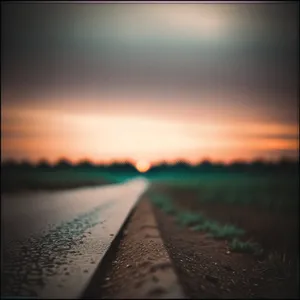 Sunset Horizon Over Rural Meadow