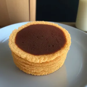 Delicious chocolate pastry and hot cappuccino for breakfast morning