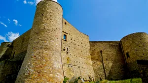 Medieval Castle Tower Against Blue Sky