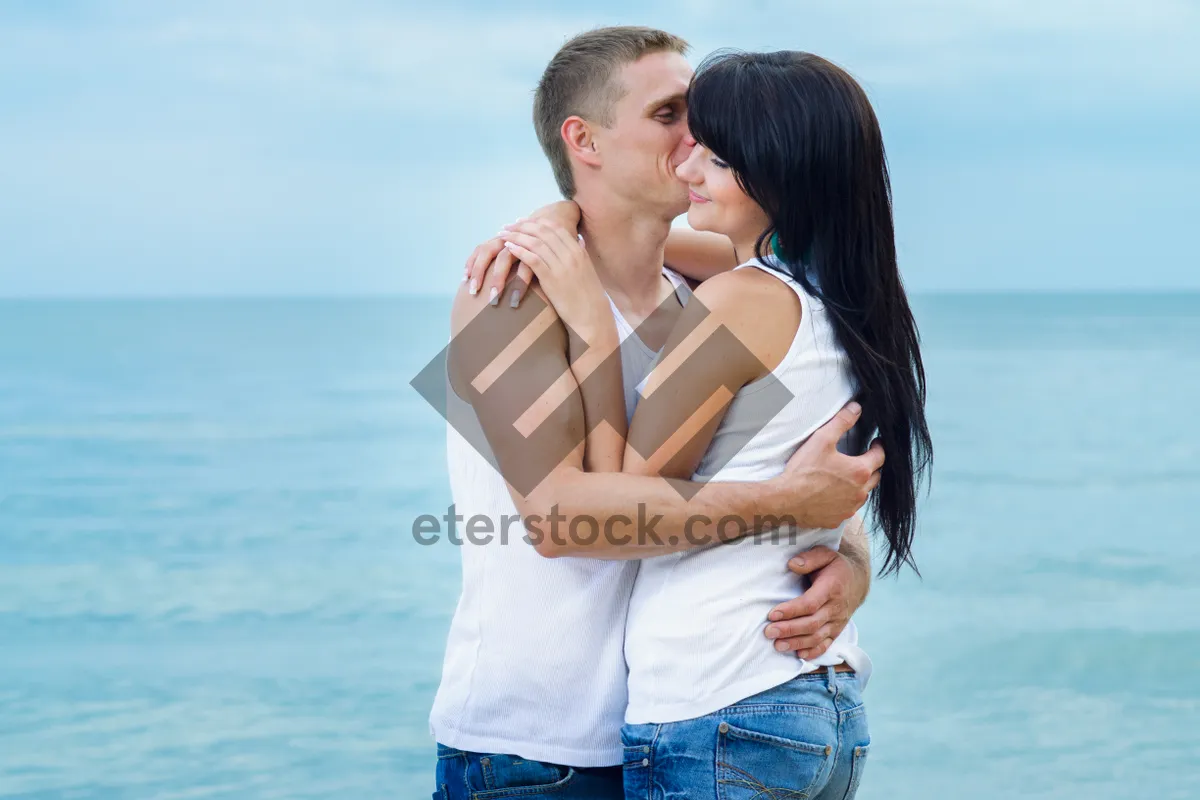 Picture of Happy couple enjoying romantic beach vacation together.