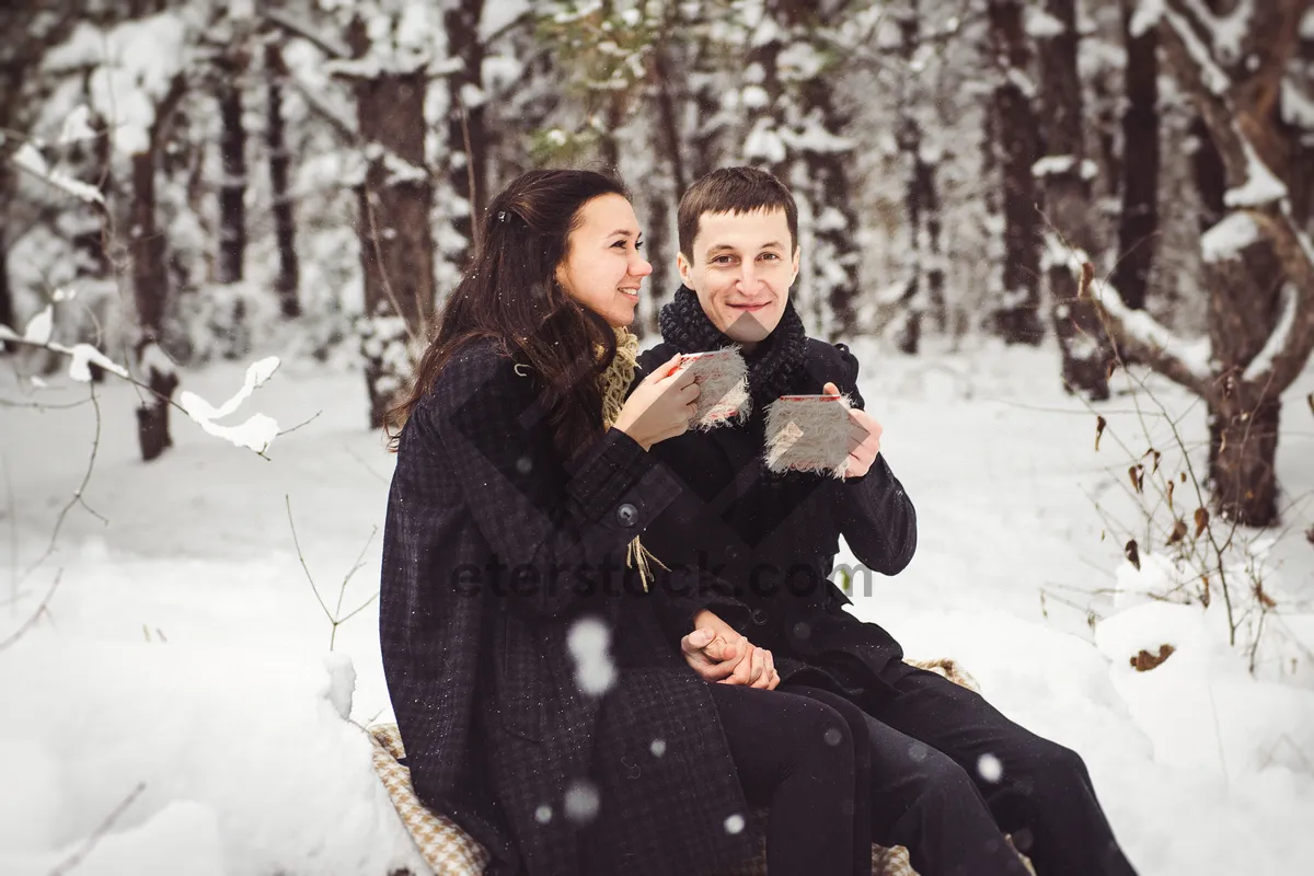 Picture of Happy mother and son smiling in snowy park