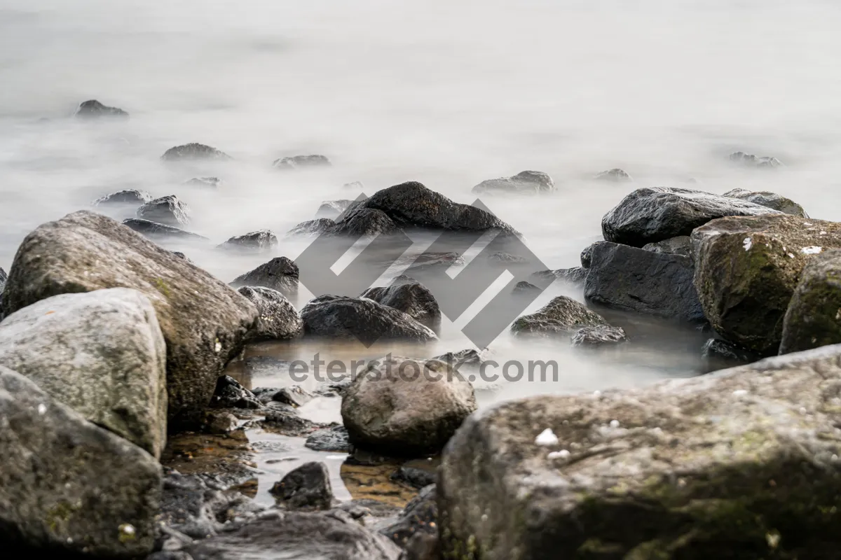 Picture of Wave-breaking rocks at coastal shoreline