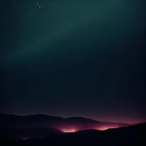 Starry Twilight Over Dramatic Landscape