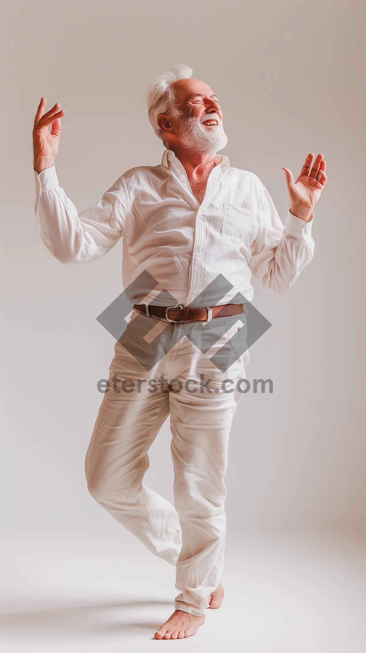 Picture of Happy smiling professional man standing in studio portrait.