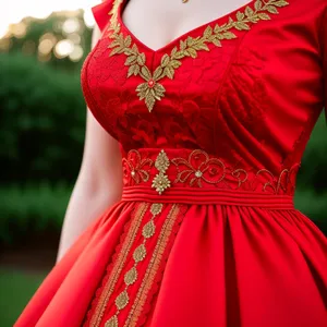 Pretty brunette lady in lovely embroidered dress