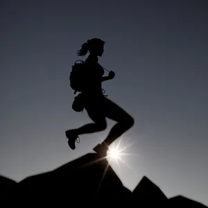 Dynamic Runner in Silhouette, Embracing Competition