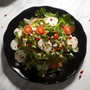 Gourmet grilled vegetable plate with fresh salad