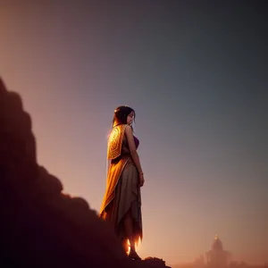 Majestic Monk Silhouette Embracing Sunset Sky