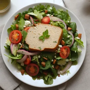 Delicious gourmet salad plate with fresh vegetables and cheese