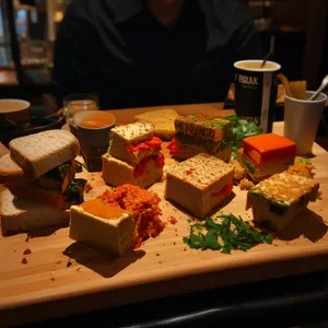 Cheese plate on restaurant table with spices