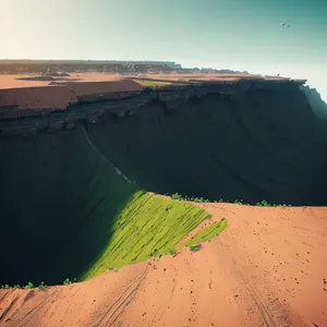 Serene Mountain Valley Surrounded by Majestic Cliffs