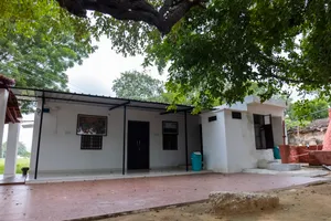 New residential home with garage and vehicle