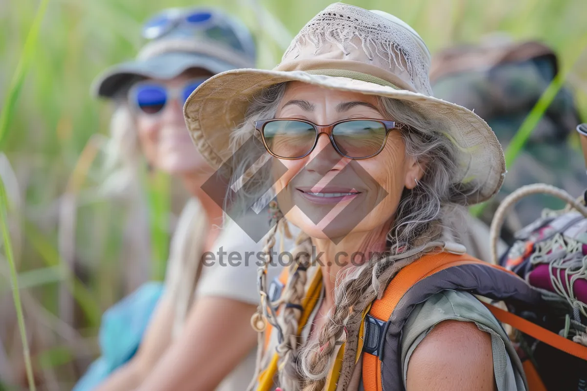 Picture of Happy person in cowboy hat enjoying summer outdoors