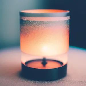 Candlelit Glass Cup with Illuminated Beverage