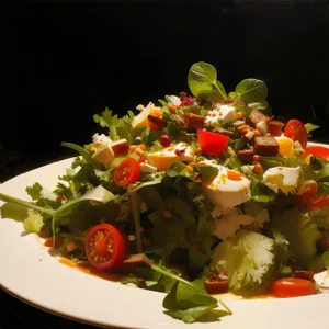 Fresh vegetable salad with cherry tomatoes and cheese.