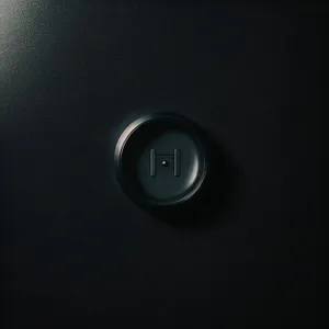 Black push button device - sleek technology at fingertips