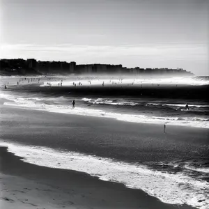 Tranquil Horizon: Beach Waves Under Sunny Sky