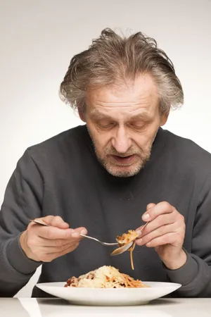 Happy elderly man holding crayfish - Retirement celebration