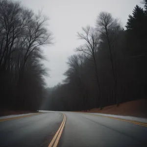 Scenic Mountain Drive Through Cloudy Sky