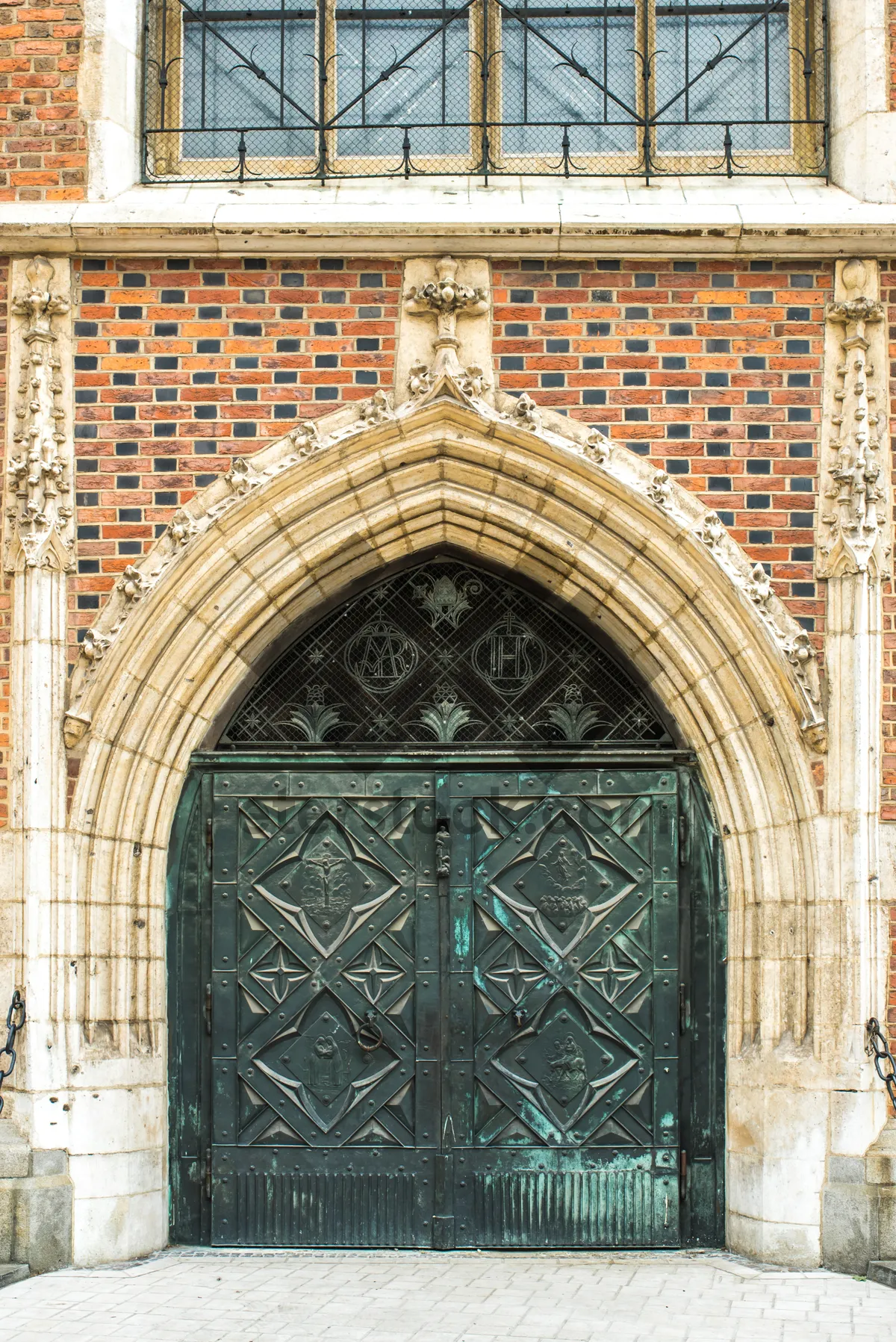 Picture of Medieval Cathedral Facade with Stone Arch Entrance