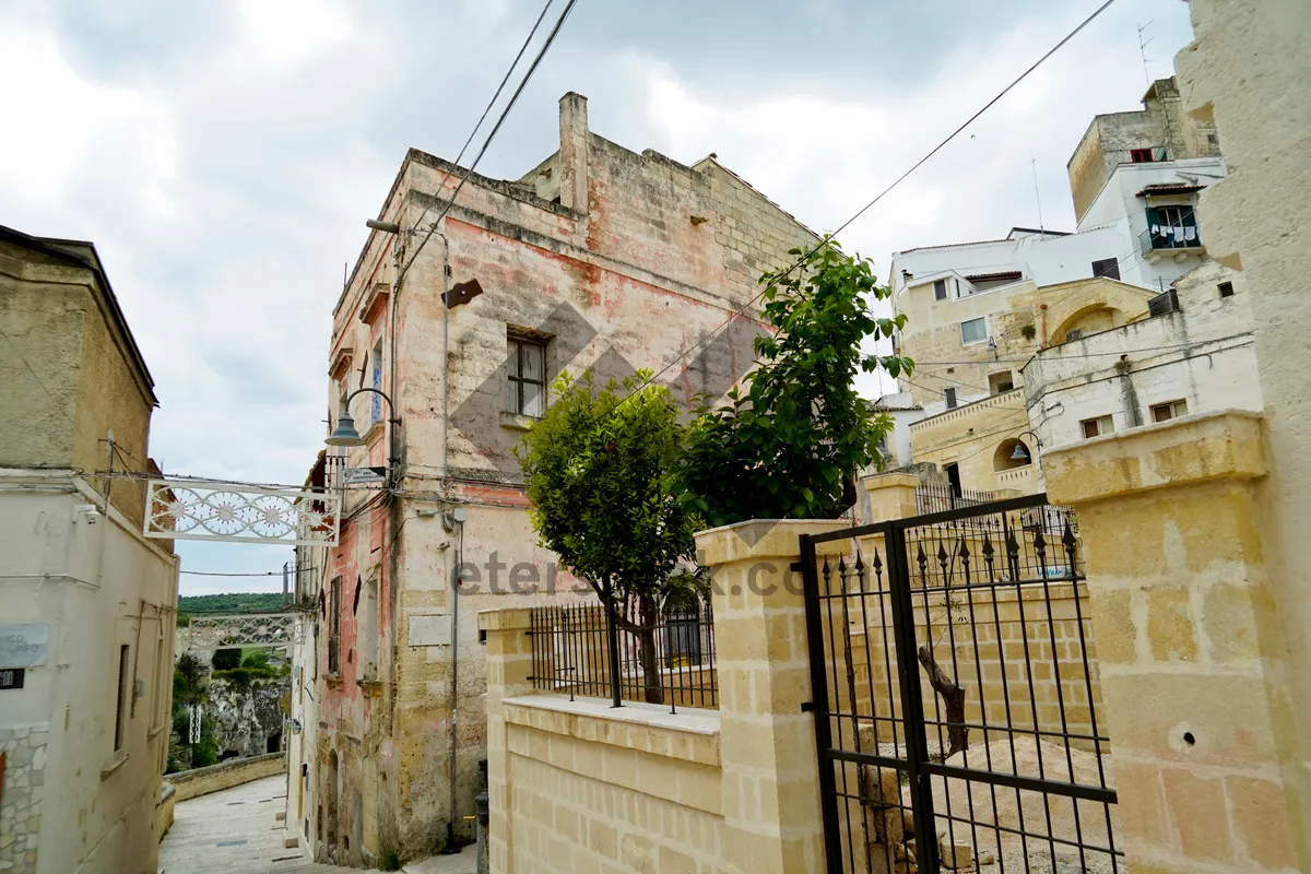 Picture of Ancient palace with stone walls and sky backdrop.