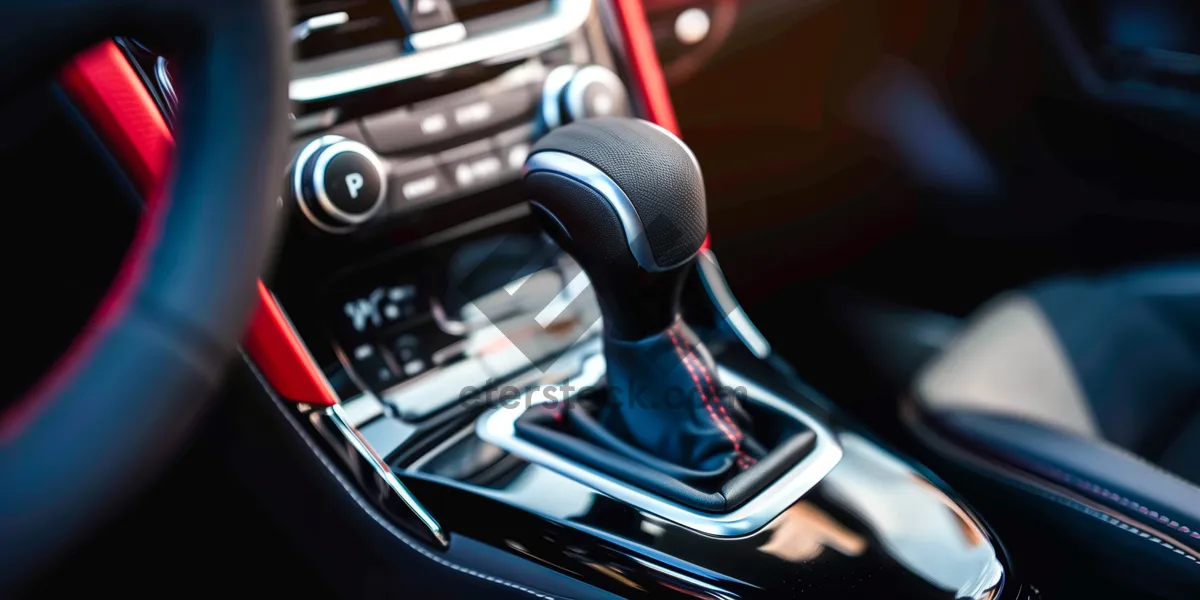 Picture of Digital car cockpit with gearshift in vehicle seat