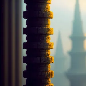 Metal Wealth: Stack of Coins with Screw Restraint