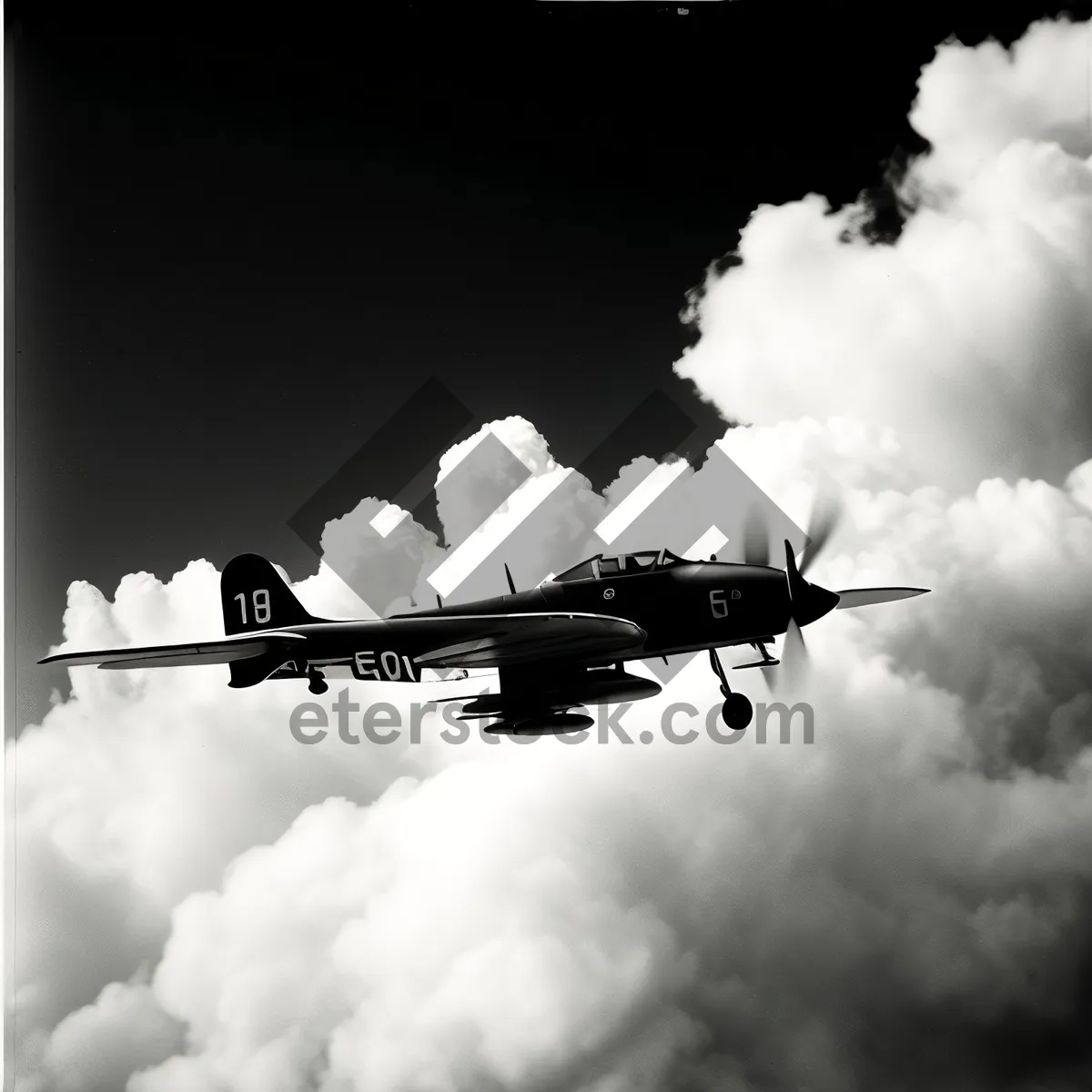 Picture of Military Jet in Flight over Cloudy Skies