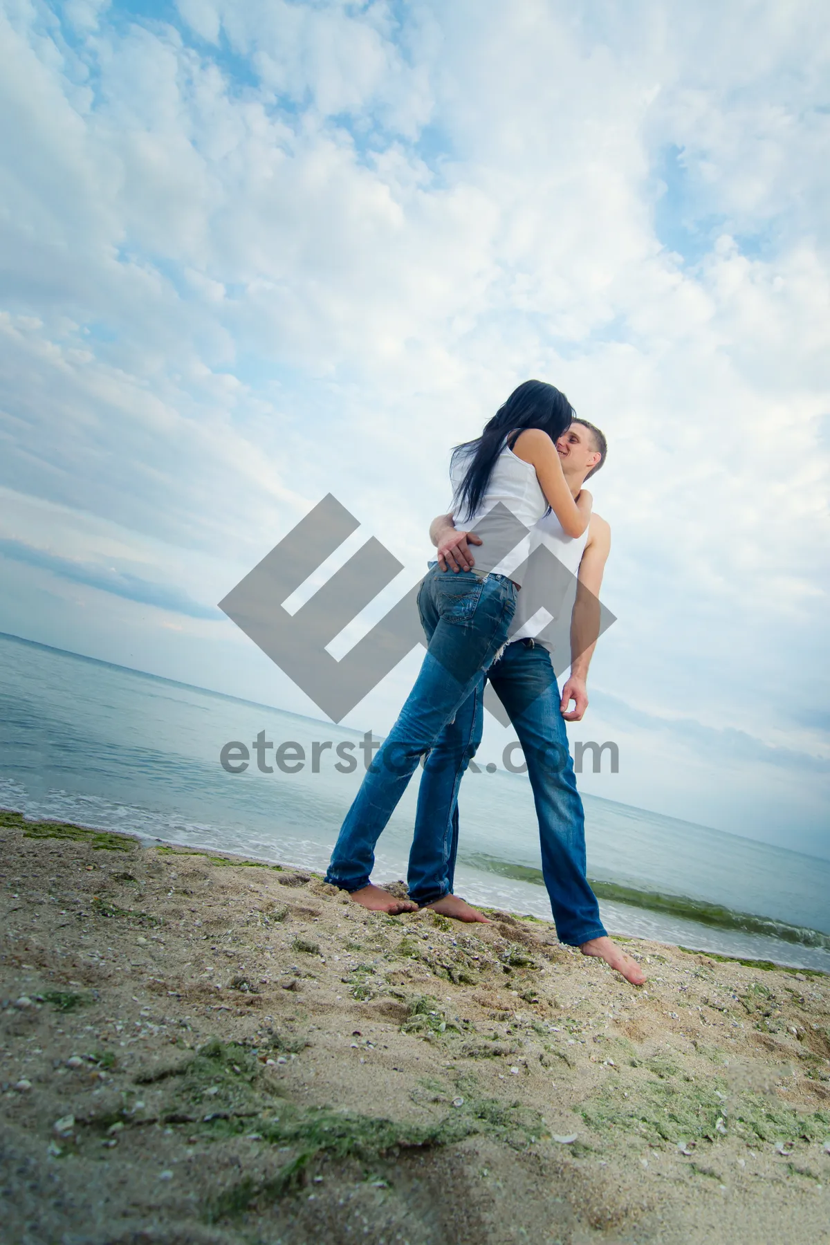 Picture of Happy man on beach enjoying summer vacation by the sea.