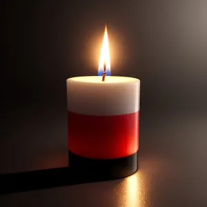 Fiery Glow - A Vibrant Candle Illuminating the Dark