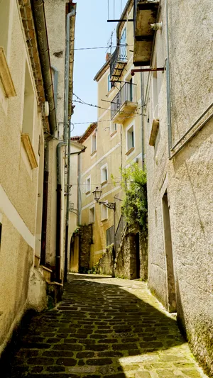 Historic stone house in quaint medieval alley.