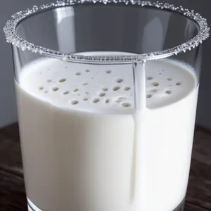 Refreshing Milk in a Glass Cup