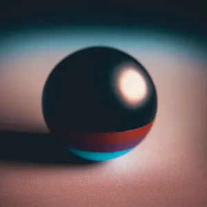 Round Electronic Device on Pool Table