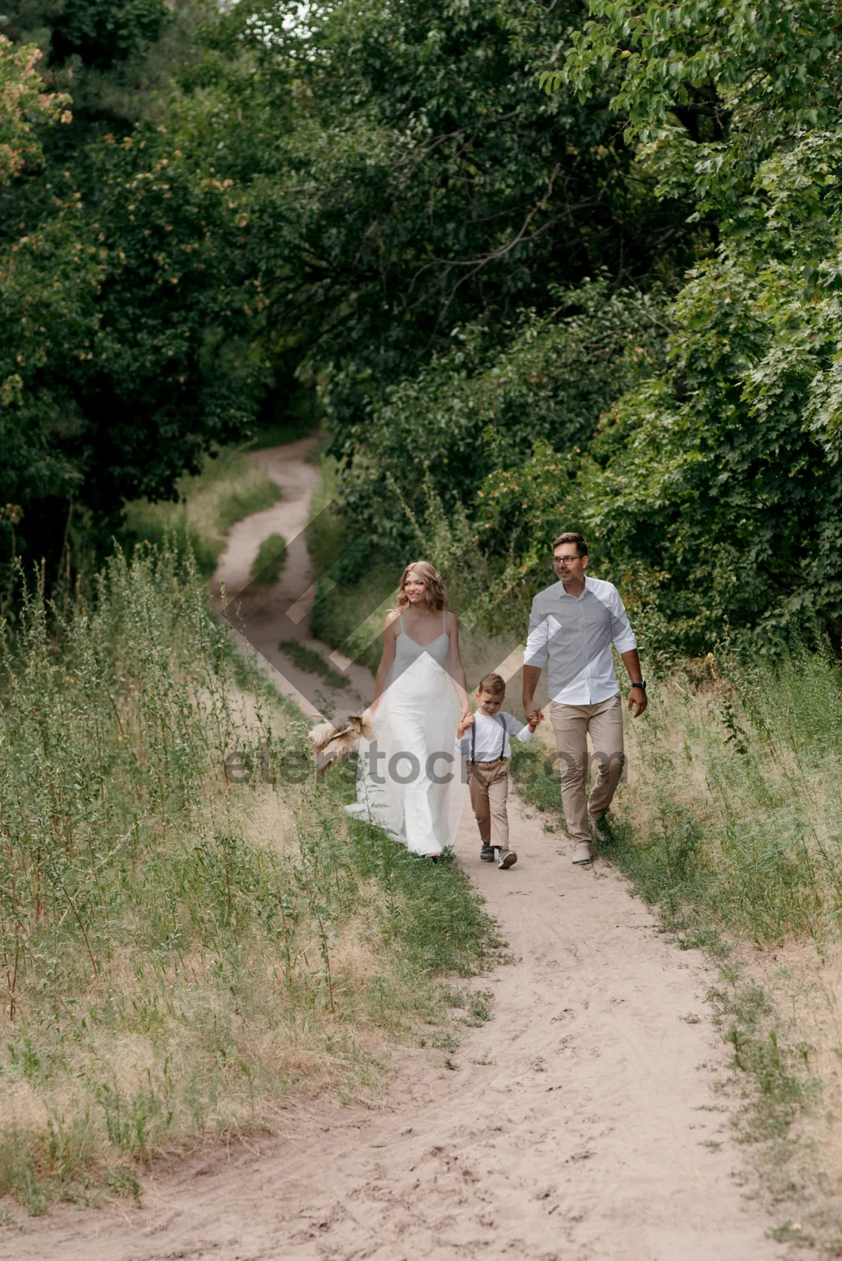 Picture of Happy couple walking in summer park