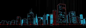 Modern city skyline with tall office buildings at night