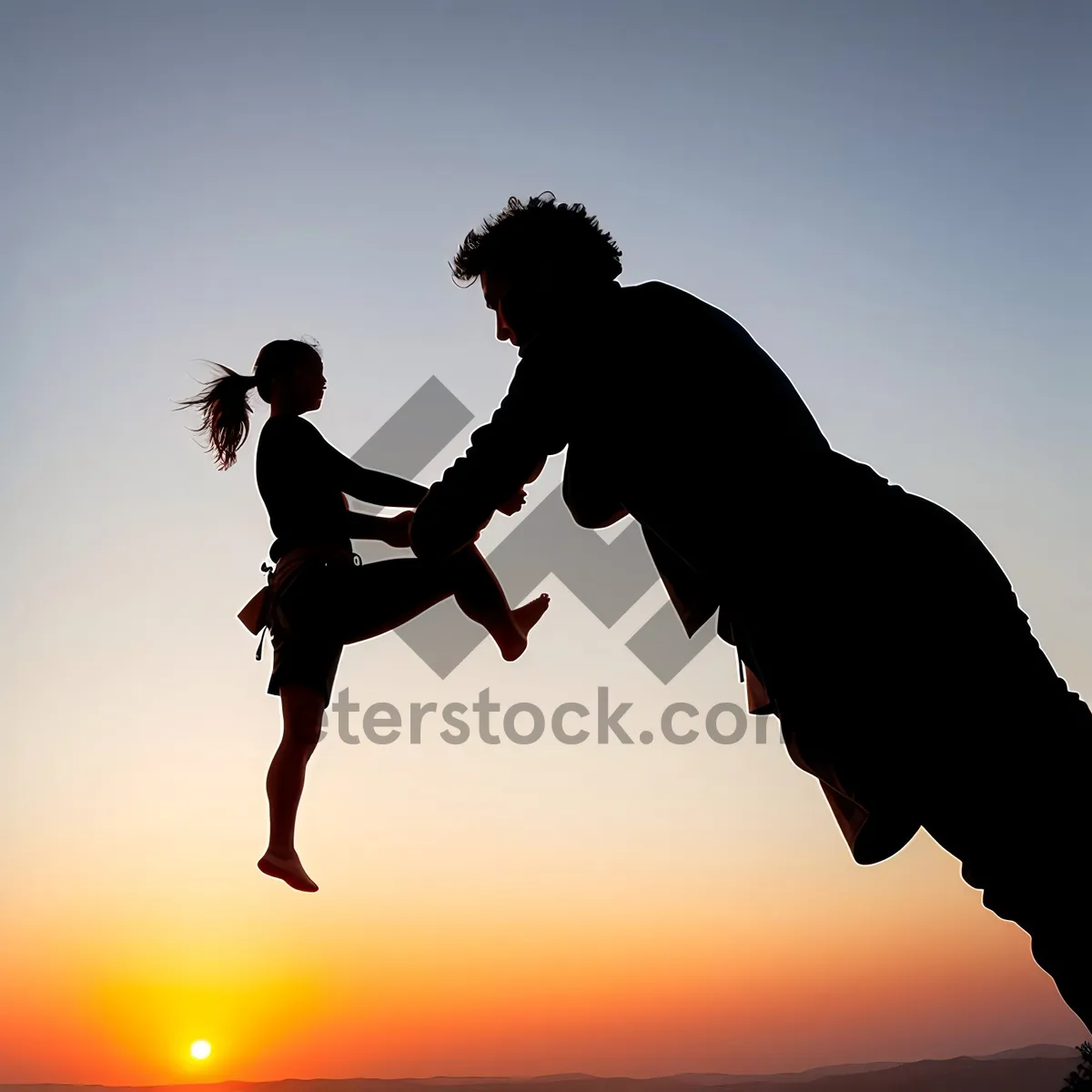 Picture of Silhouette Skate Jump at Sunset: Active Fun in the Sun