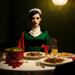 Happy person enjoying dinner at restaurant table.
